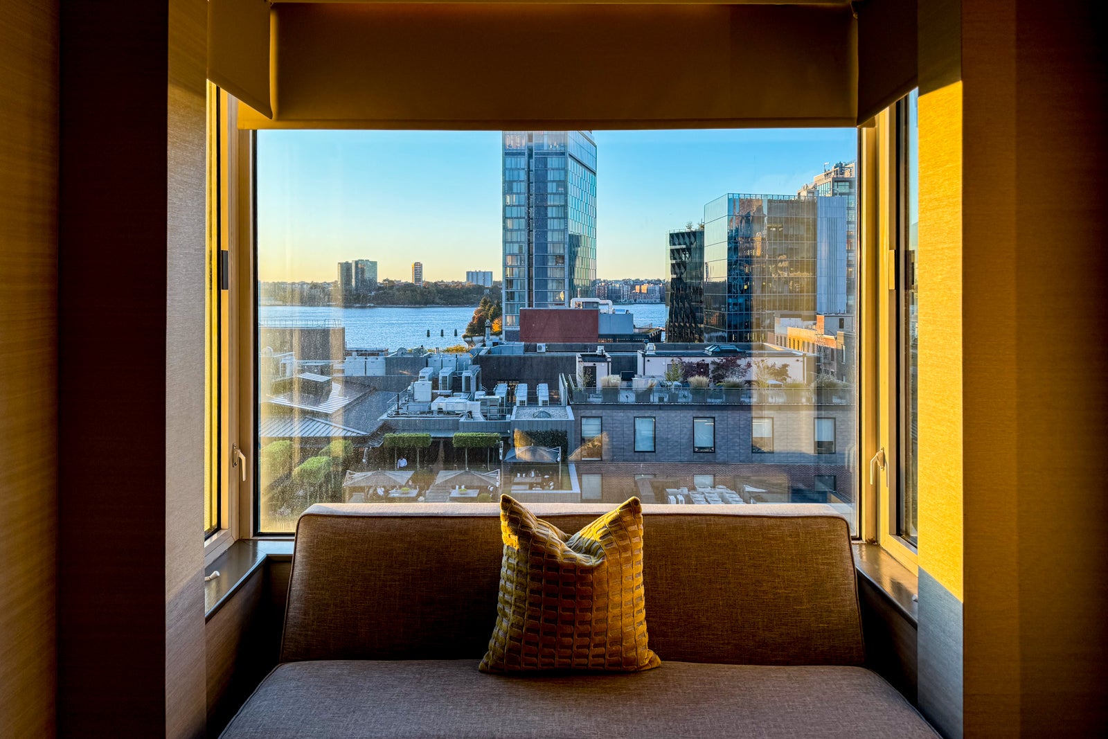 hotel room with city skyline in background