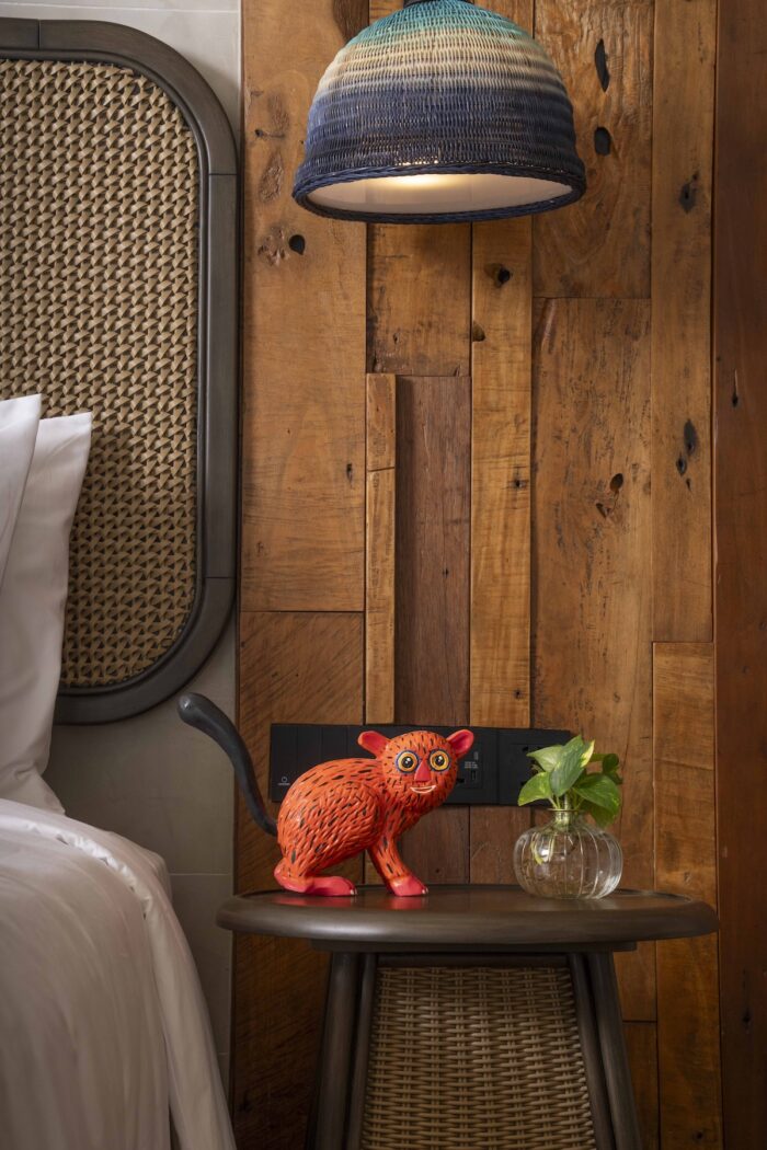 A tarsier wood carving in every room