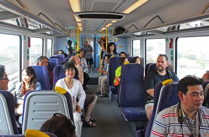 peopel riding the Bangkok airport rail link
