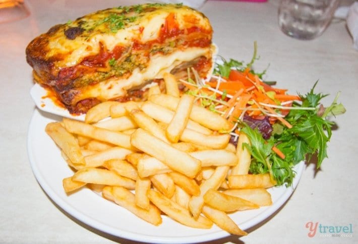 lasagna and chips at Cock & Bull Pub in Cairns, Australia
