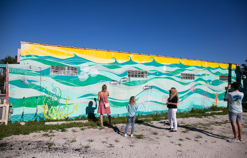 people looking at hobe sound murals