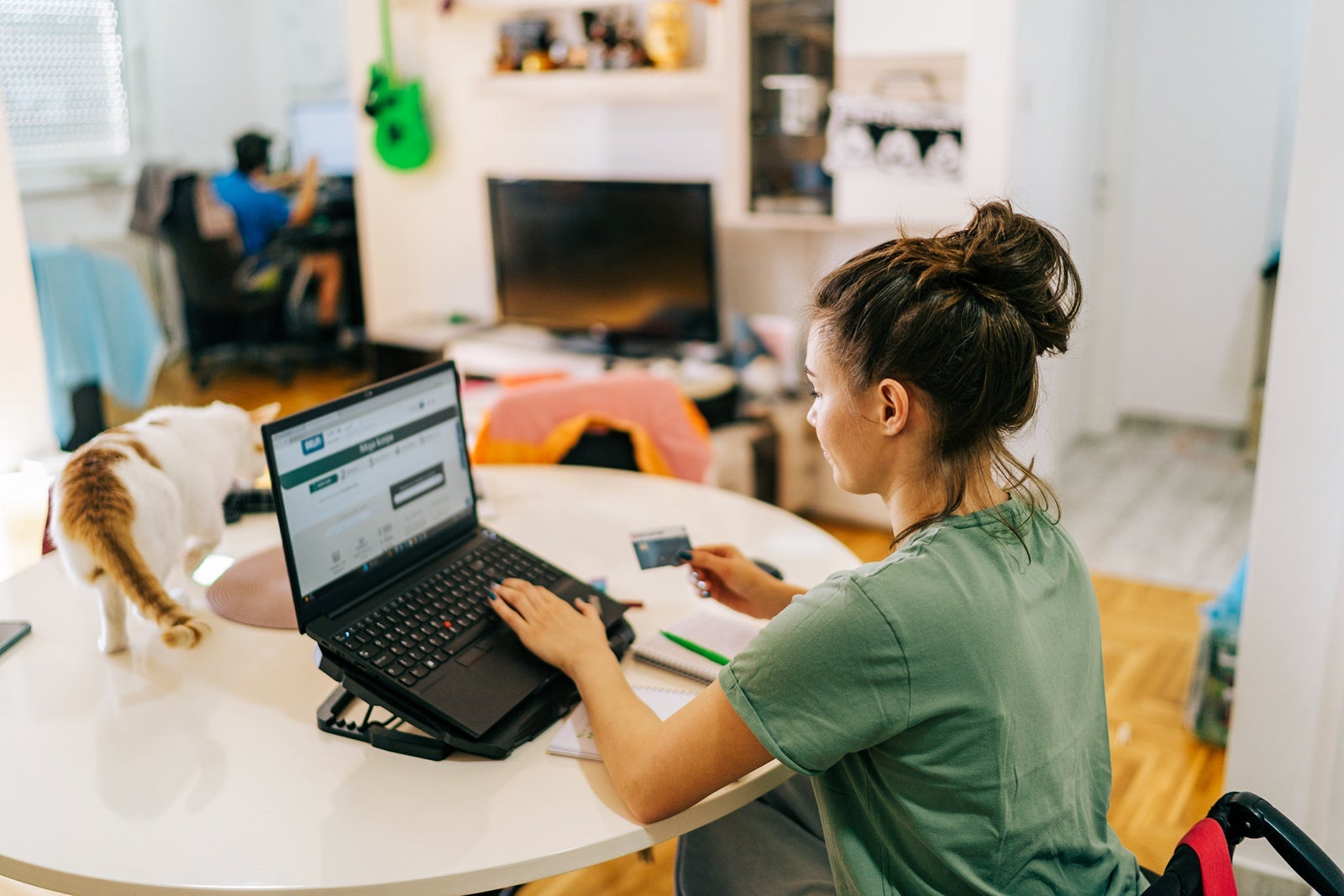 Person using laptop at home