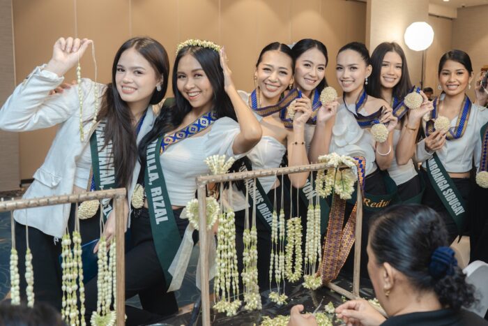 Miss Philippines Earth 2025 candidates tried their hands on sampaguita lei making with the lei makers from San Pedro, Laguna.