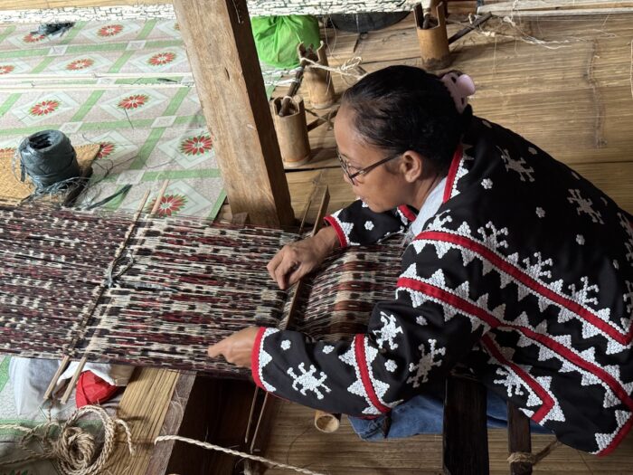 Tnalak Weaver inside the house of Barbara Ofong
