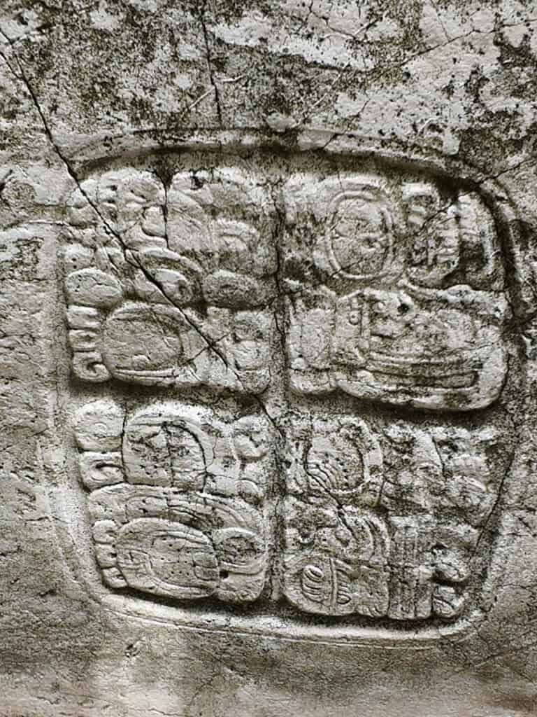 heiroglpyhs carved into rock 
