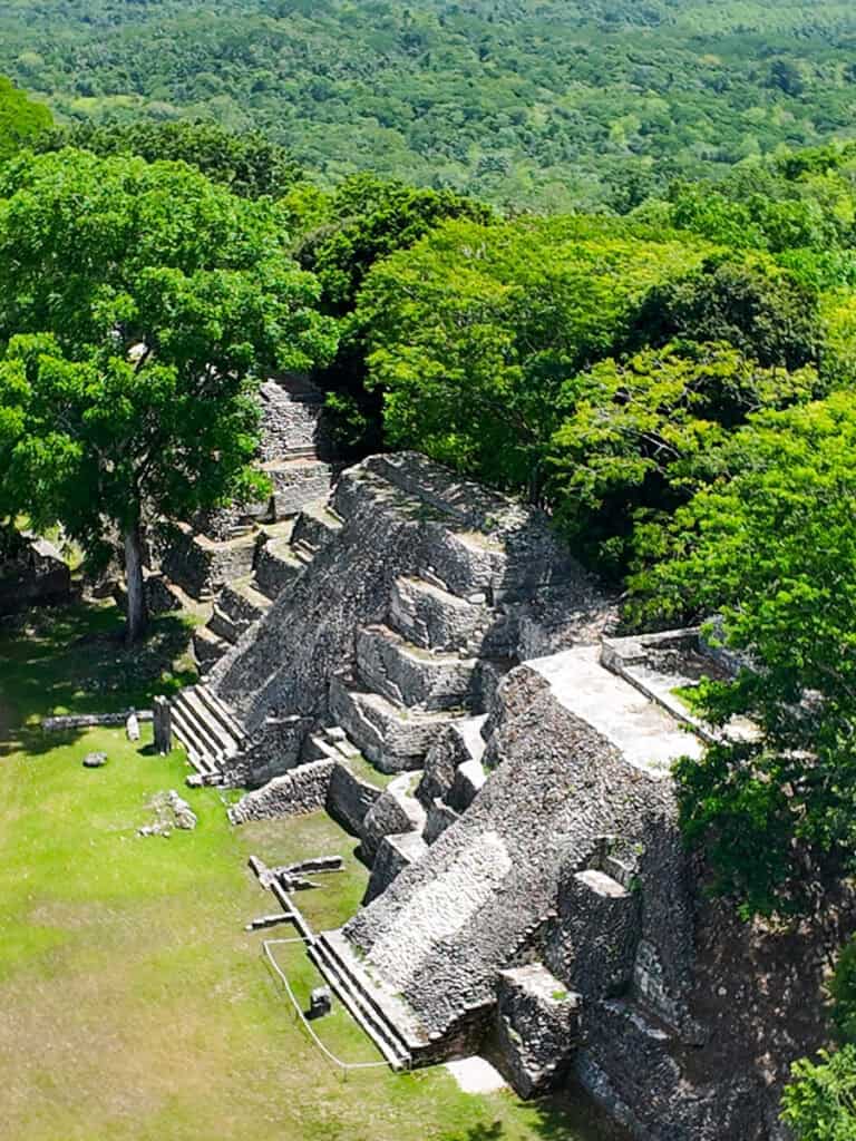 looking down on stone buildings in Xunantunich 