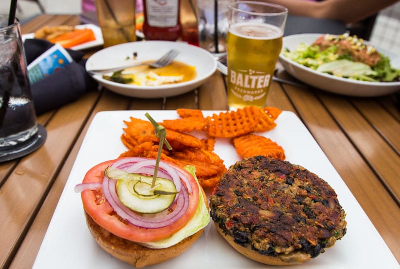 burger on plate witih pints of beer on table Balter Beerworks, Knoxville