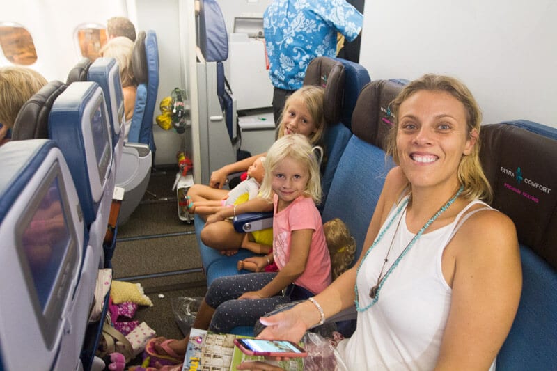 family sitting in Extra Comfort seats flying to Hawaii on Hawaiian Airlines