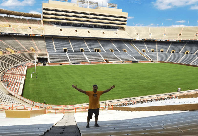 man standing in front of new of Neyland Stadium