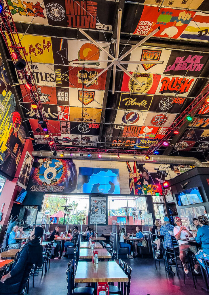 People dining in a rock and roll themed restaurant.