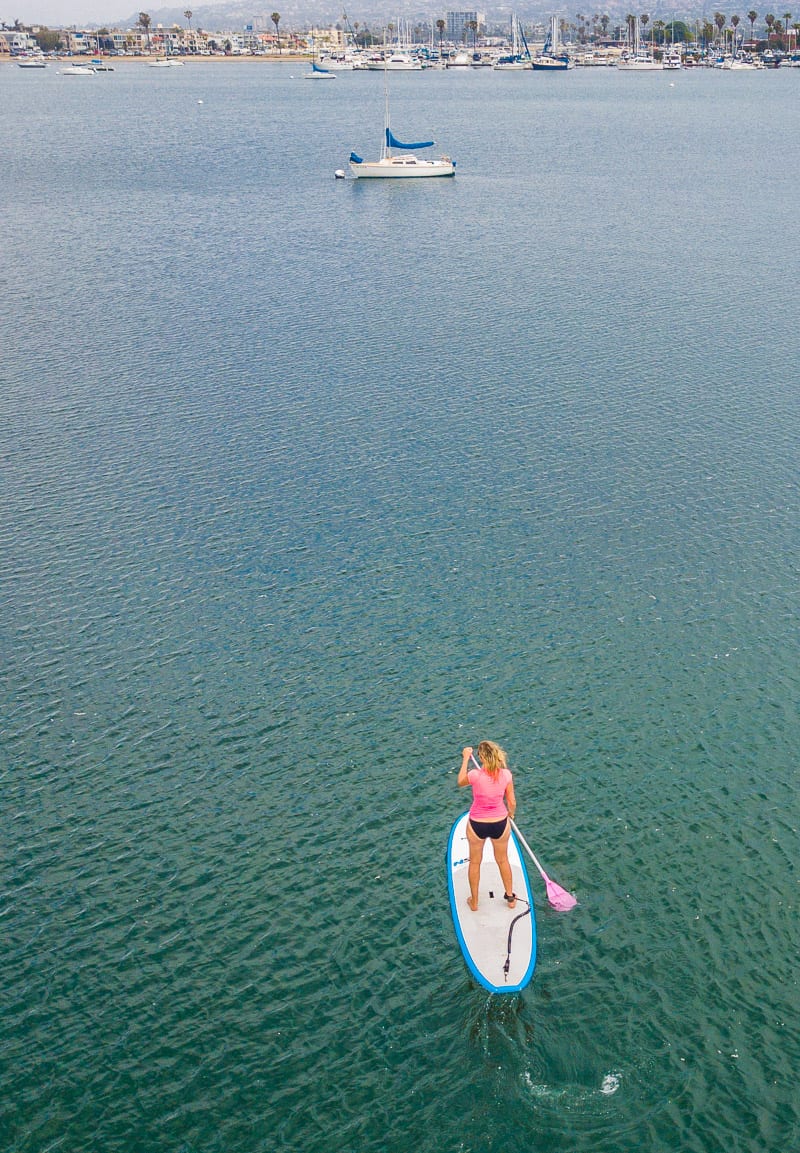 woman Stand up paddle boarding in Mission Bay