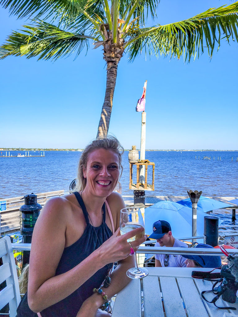 Lwoman with glass of wine at restaurant